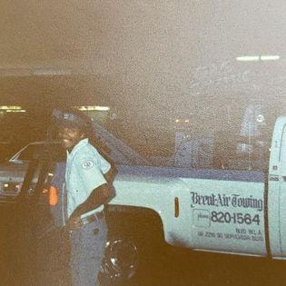 Lester standing by at Jim's Shell — Los Angeles, 1979